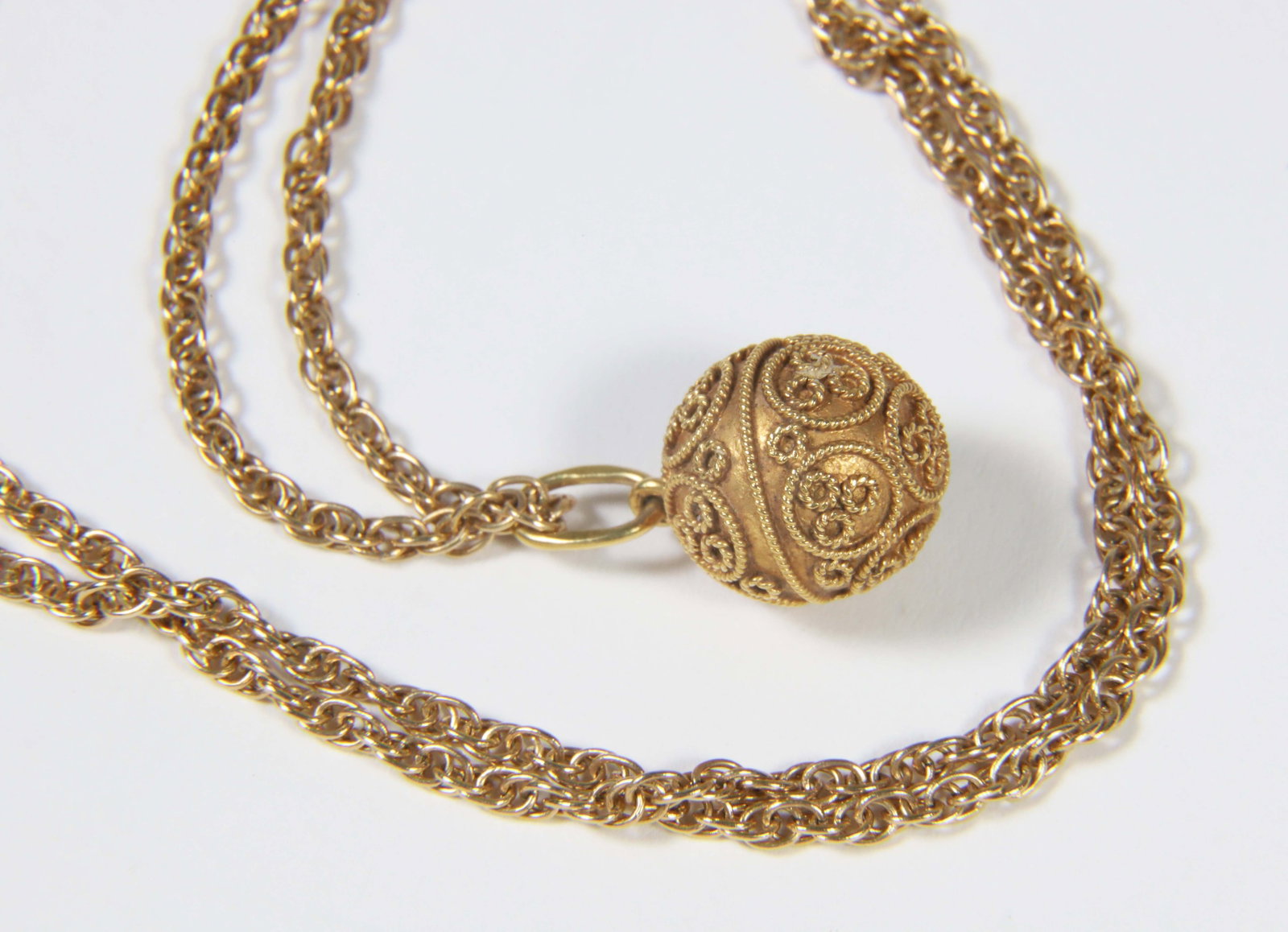 Vintage Ilias Lalaounis 18K Yellow Gold Ball Pendant and Chain: Vintage Ilias Lalaounis 18K Yellow Gold Ball Pendant and Chain, 6.39g, 4.11dwt Length 16 in. Ball 11mm x 11.5 mm