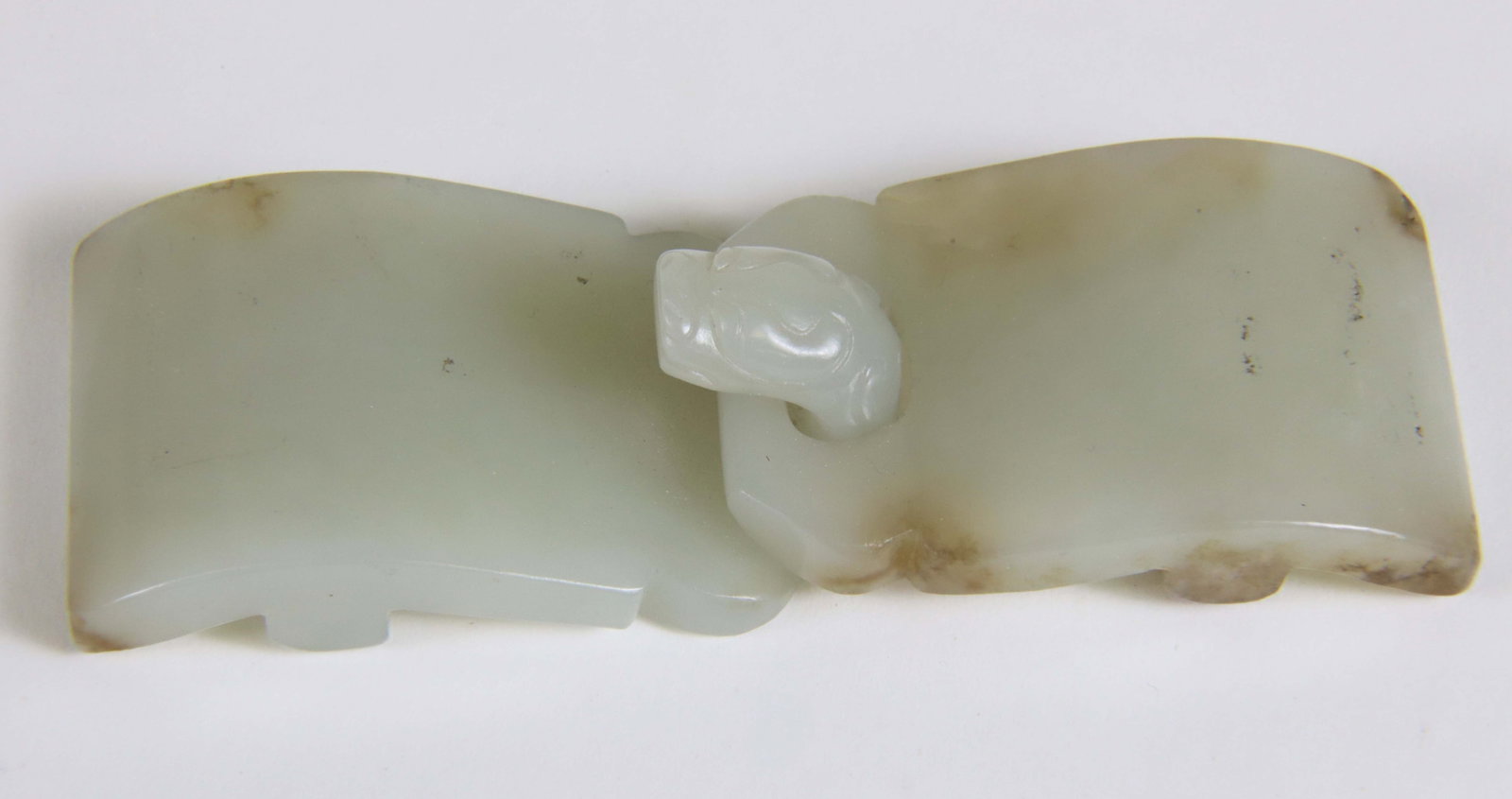 Celadon Jade "Chilong" Belt Buckle, Qing Dynasty: Celadon Jade "Chilong" Belt Buckle, Qing Dynasty, in two sections. Lengths 3.5 in.