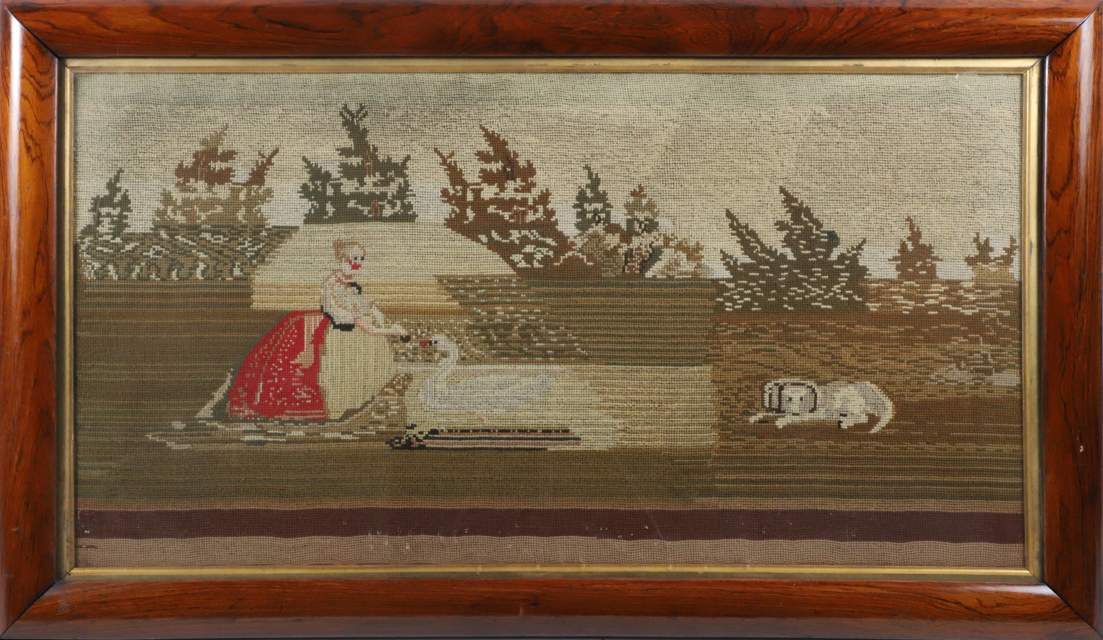 Large English Regency Needlework, 19th Century: Large English Regency Needlework, 19th Century, depicting a woman feeding a swan with dog in a landscape setting, in exotic frame with gilt liner 19.5 in. x 37.5 in. Framed 25.5 in. x 43.5 in.