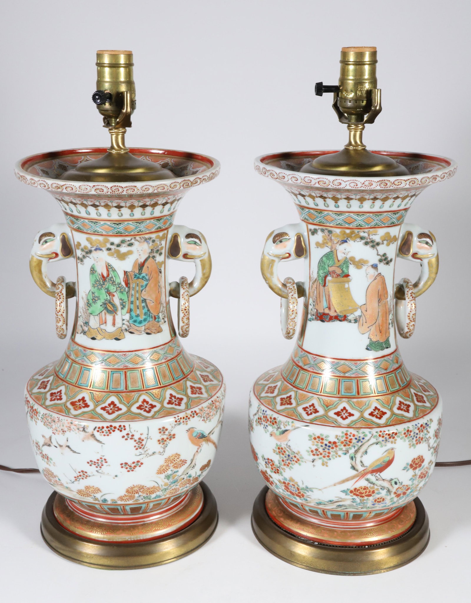 Pair of Chinese Famille Rose Porcelain Vases, 19th Century, Mounted as Lamps: Pair of Chinese Famille Rose Porcelain Vases, 19th Century, Mounted as Lamps, hand painted figures and foliage throughout, elephant head side handles with loose rings Height 15 in.