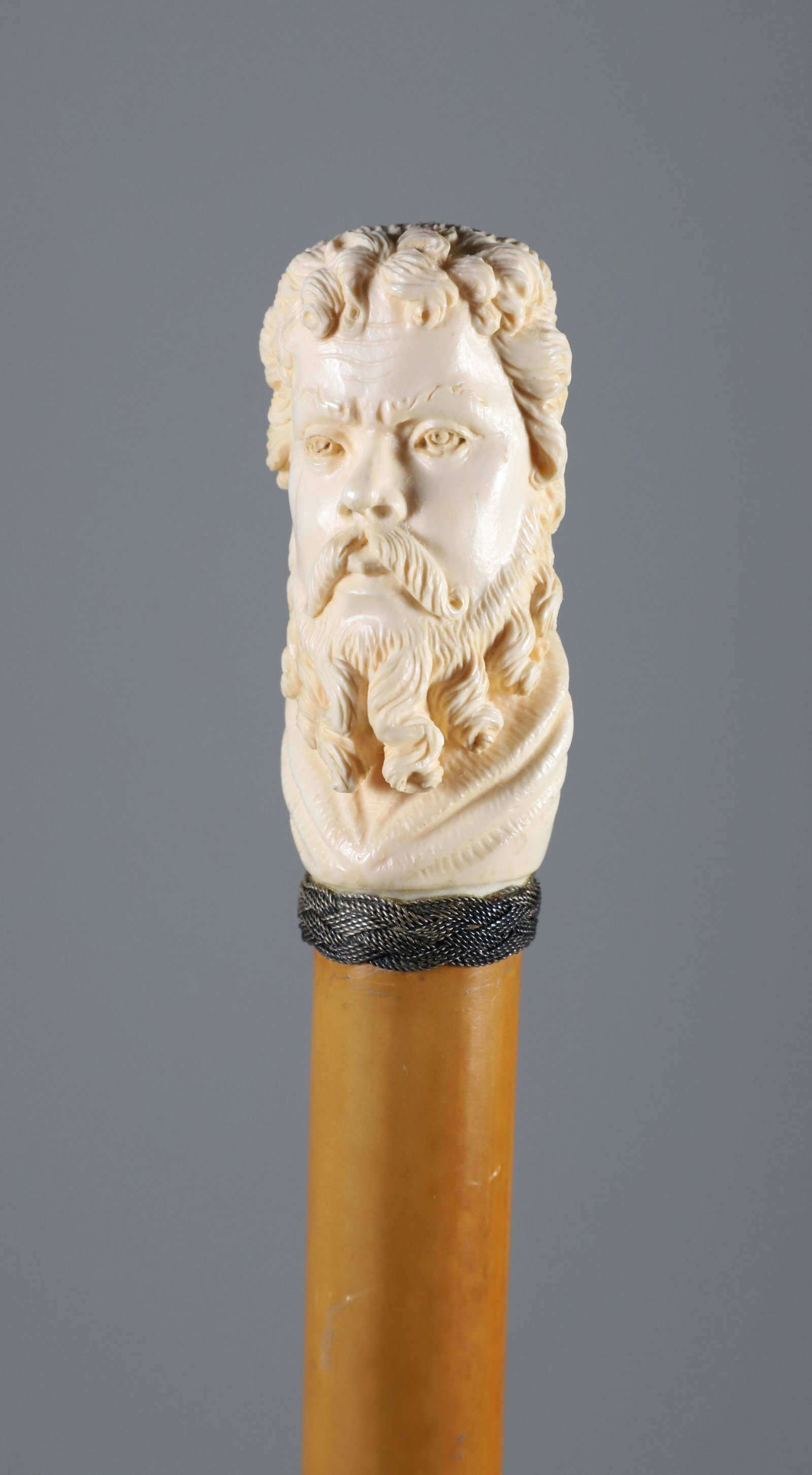 Carved Gentleman Knob Walking Stick, 19th Century: Carved Gentleman Knob Walking Stick, 19th Century, braided silver collar on malacca shaft.**Note: This item is not available for International Delivery. Length 34.5 in.