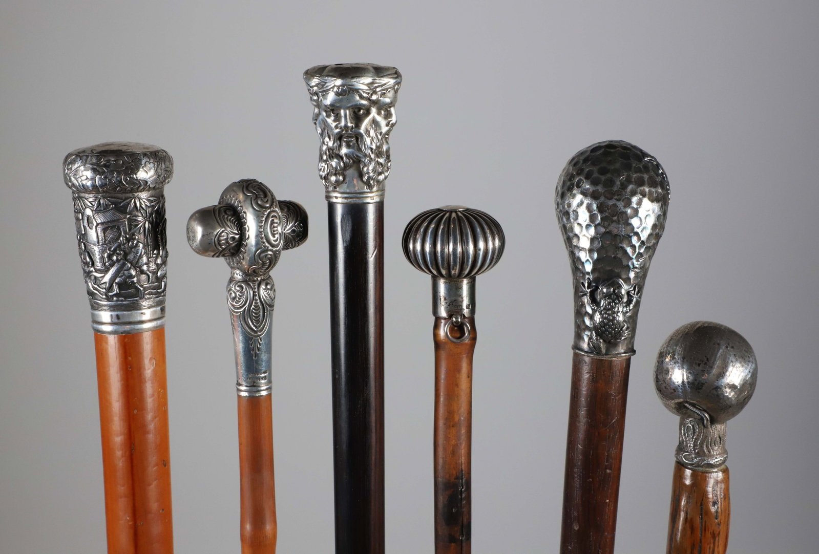 Six Sterling Silver Filled Handle Grip Walking Sticks, 19th Century: Six Sterling Silver Filled Handle Grip Walking Sticks, 19th Century, on wood shafts. Lengths 33 in. to 37 in. Provenance:The Estate of Herbert E. Sackett, Bristol, Rhode Island