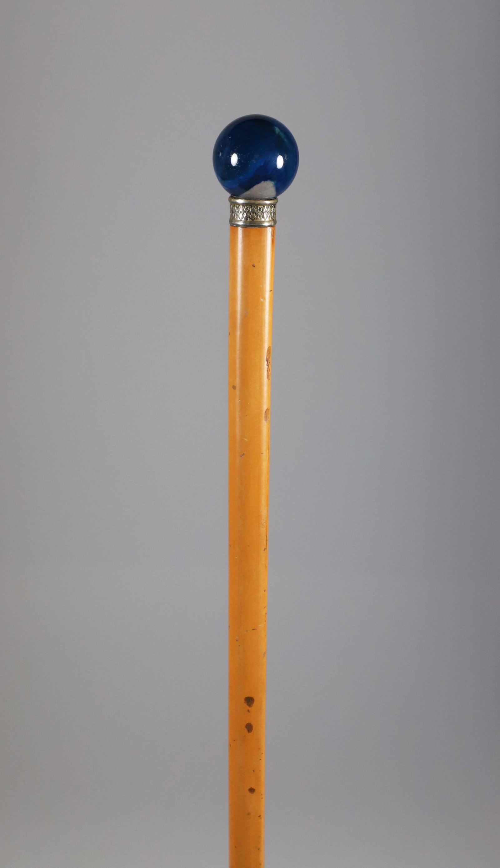 Blue Stone Orb Grip Walking Stick, 19th Century: Blue Stone Orb Grip Walking Stick, 19th Century, silver collar on malacca shaft. Length 34.5 in. Provenance: The Estate of Herbert E. Sackett, Bristol, Rhode Island