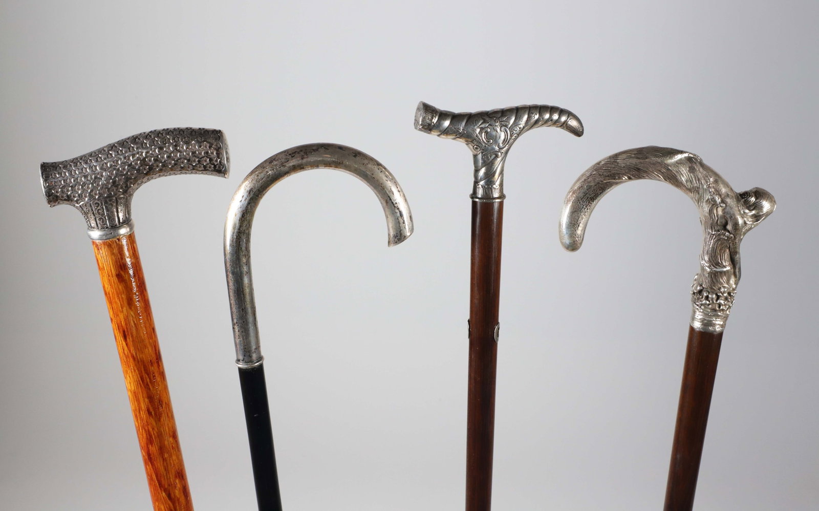 Four Sterling Silver Handled Canes, 19th Century
