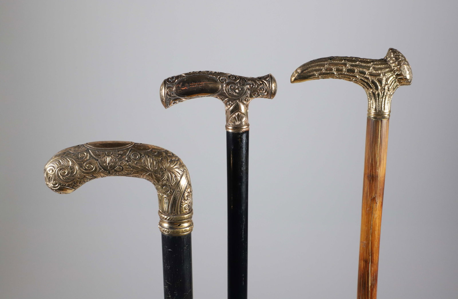 Three Antique Repousse Gold Filled Handle Canes, 19th Century