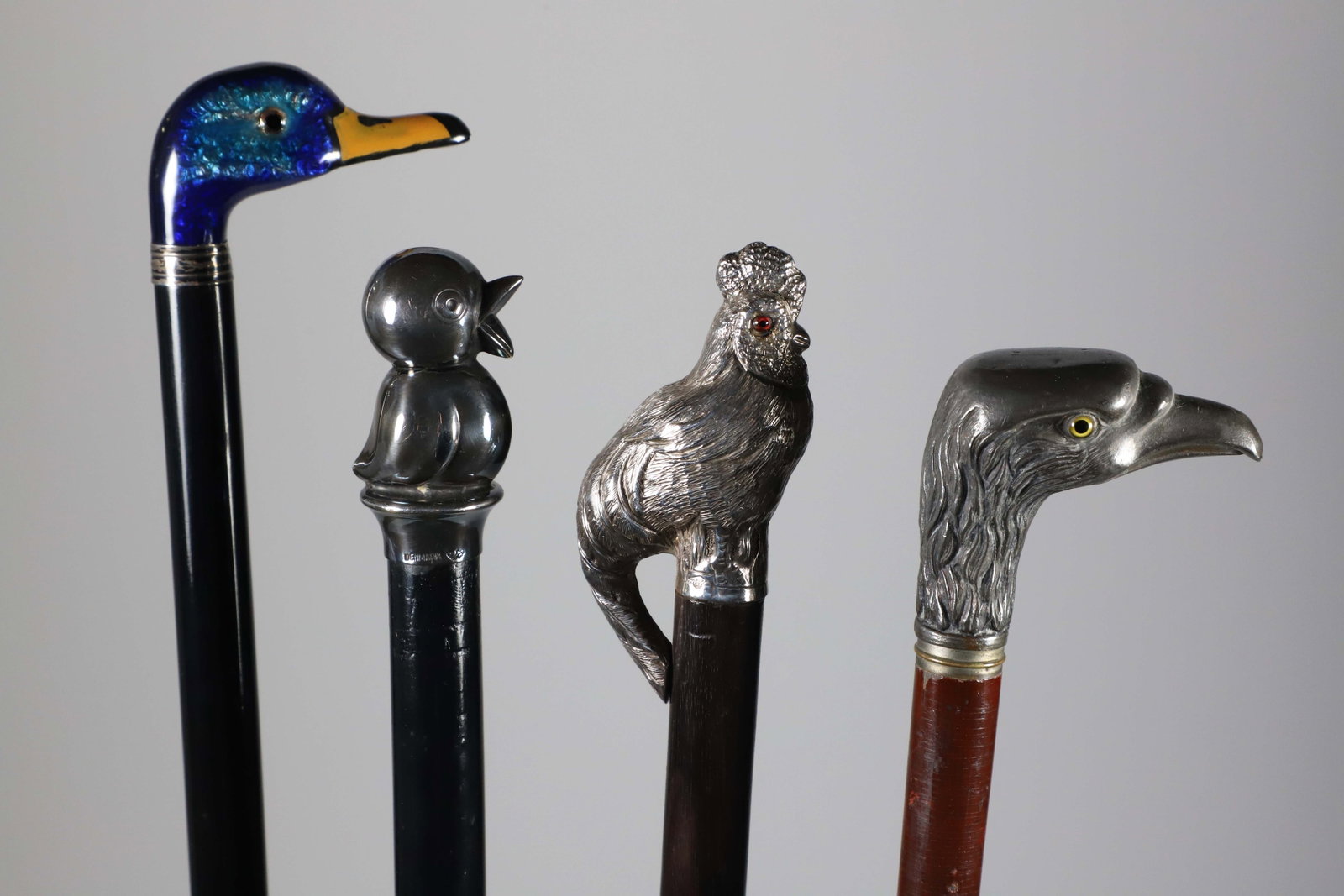 Four Various Vintage Bird Grip Walking Sticks