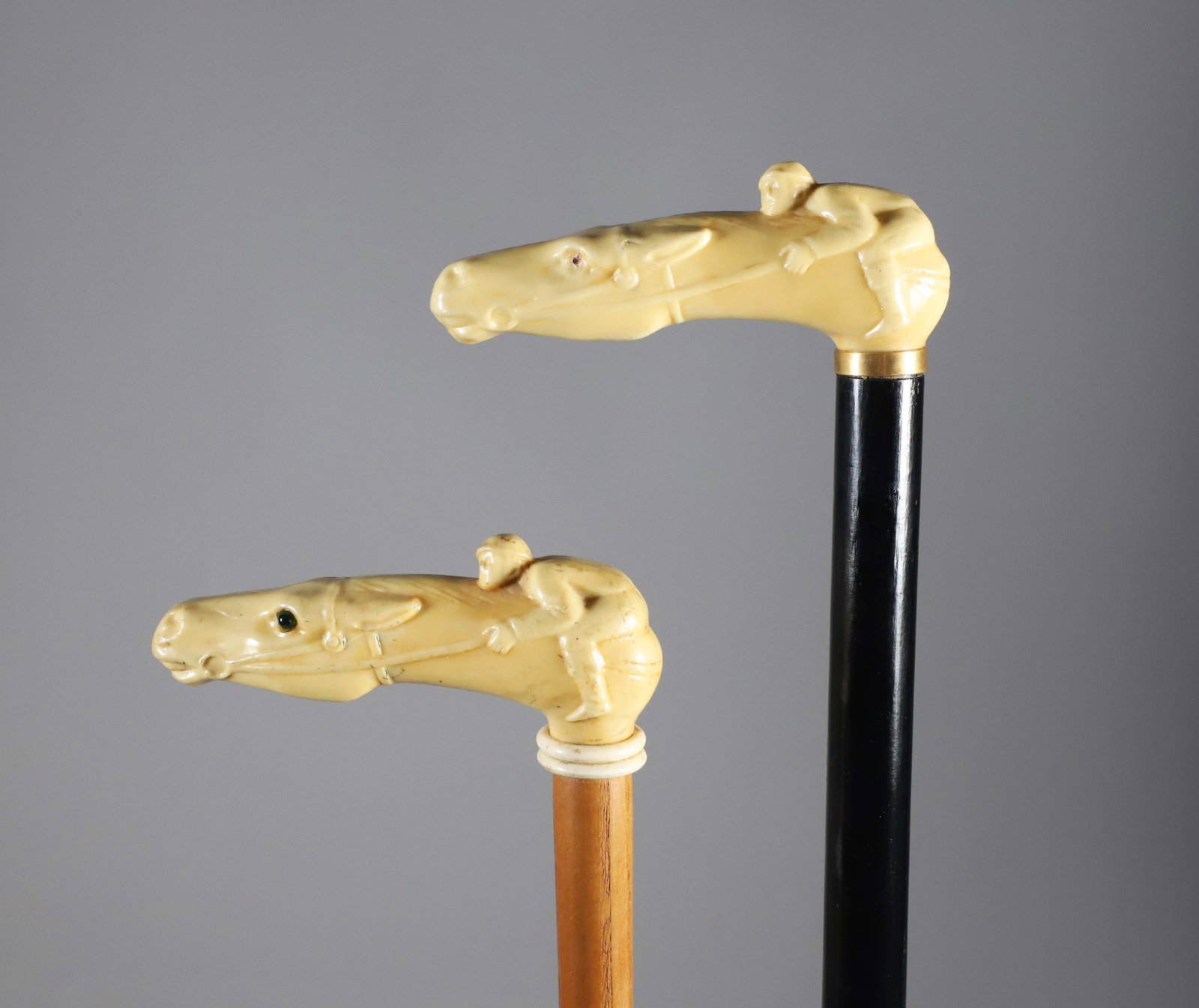 Two Vintage Composition Horse and Jockey Canes: Two Vintage Composition Horse and Jockey Canes Lengths 37 in. and 36 in. Provenance: The Estate of Herbert E. Sackett, Bristol, Rhode Island