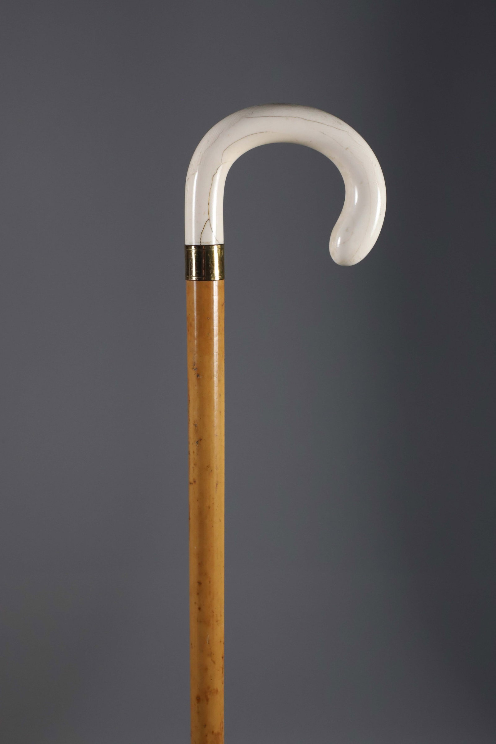 C-Grip Cane On Malacca Shaft, 19th Century: C-Grip Cane On Malacca Shaft, 19th Century. **Note: This item is not available for International Delivery. Length 35 in. Provenance: The Estate of Herbert E. Sackett, Bristol