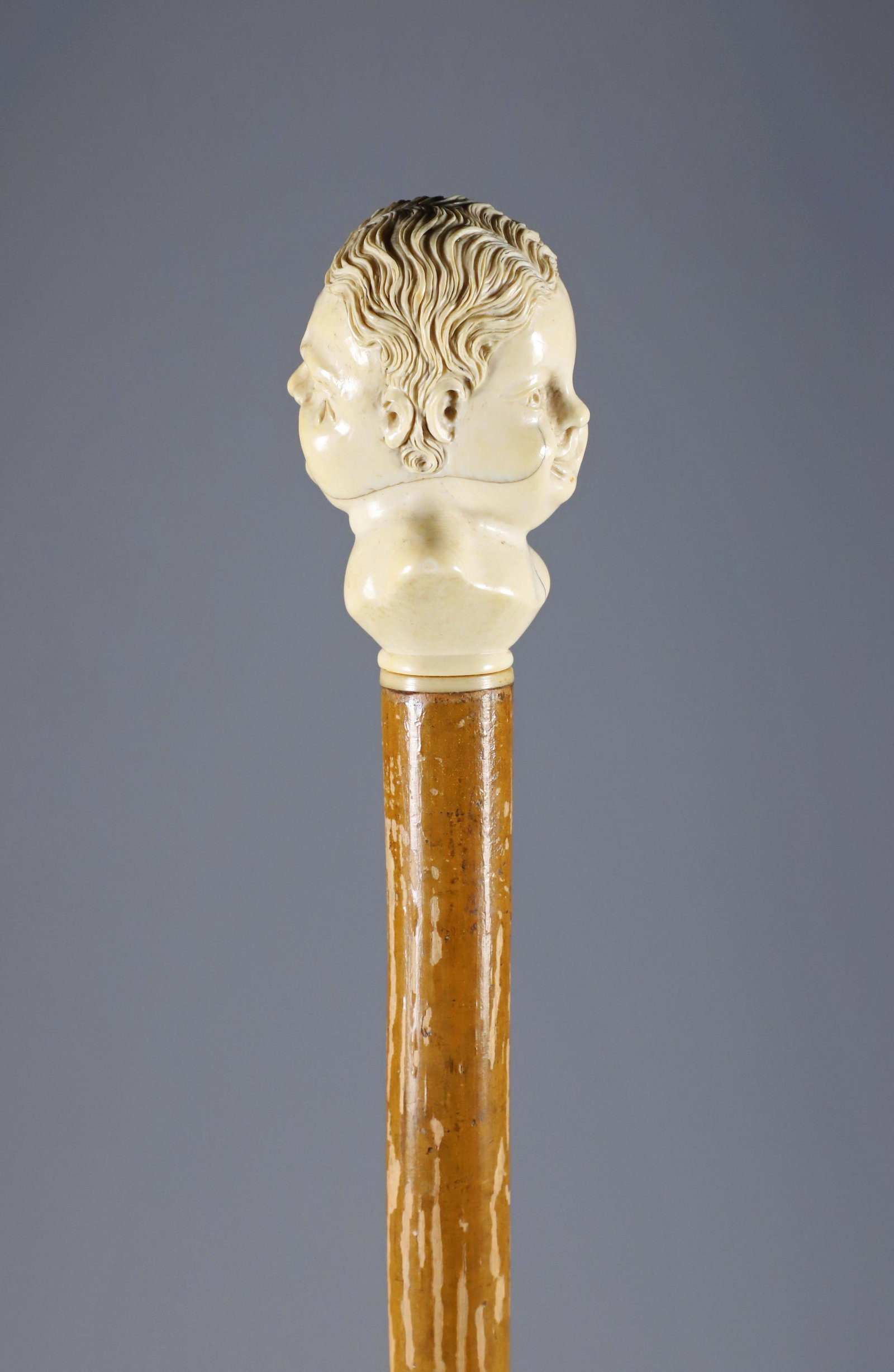 Twin Carved Bust Grip Walking Stick, 19th Century