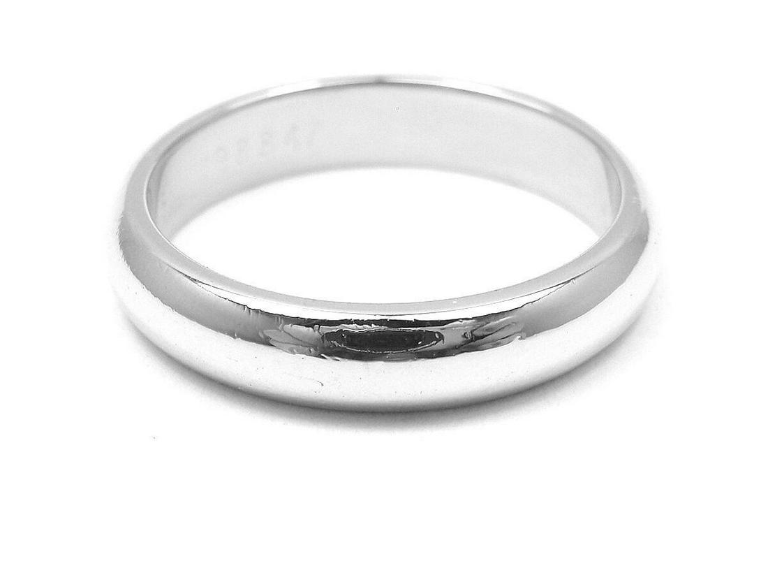 Cartier Platinum Wedding 3 Mm Band Ring: Metal: Platinum Ring Size: 4.5 US, Europe 48 Measurements: Weight: 5.1 gramsWidth: 3mm Diamonds: None Hallmarks: Cartier Pt950 48