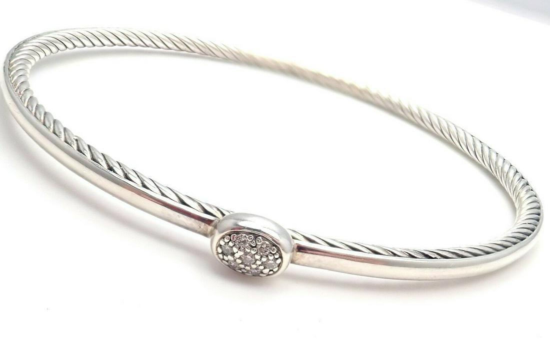 David Yurman Dy Silver Diamond Petite 3Mm Bracelet: Metal: Sterling Silver Measurements: Length: 8.25""Width: Ã¥ 3mm braceletInner Diameter: 63mm x 63mm Weight: 11.4 grams Stones: 7x Diamonds Hallmarks: DY 925
