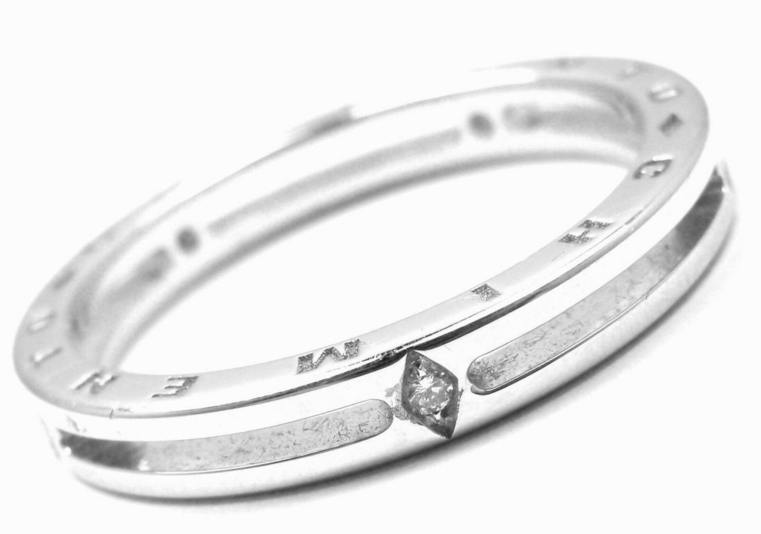 Chimento 18K White Gold Diamond Band Ring: Metal: 18k white gold Size: 9 Measurements: Weight: 4.6 grams Width: 4mm Stones: 6 Round brilliant cut diamonds VS2 clarity, G color total weight approx. 0.06ct