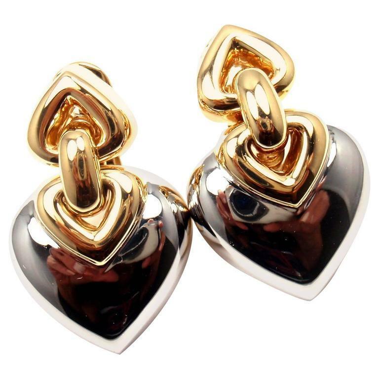 Bulgari 18K Yellow & White Gold Heart Earrings: Metal: 18k Yellow & White Gold Measurements: 32mm x 20mm Weight: 29.7 grams *** This earrings are made for non pierced ears, but can be converted by adding posts Hallmarks: Bvlgari 750 2337