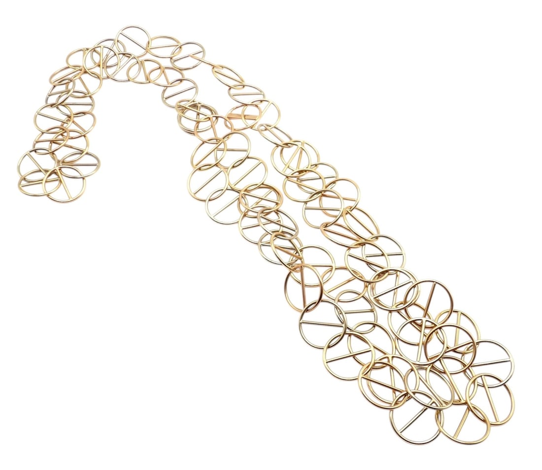 Hermes Caleche 18k Yellow Gold Extra Long or Layered Circle Necklace + Box: About This Piece: An elegant Hermes Caleche necklace crafted in 18k yellow gold, composed of interlocking circul