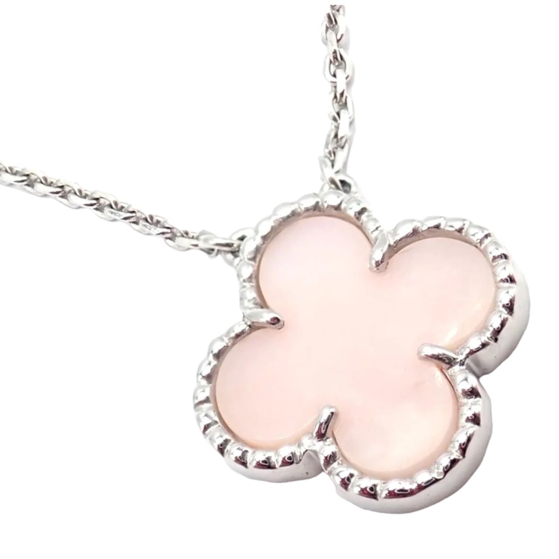 Van Cleef & Arpels Alhambra 18k White Gold Pink Opal Pendant Necklace: About This Piece: The Van Cleef & Arpels Alhambra 18k White Gold Pink Opal Pendant Necklace is a stunning piece o