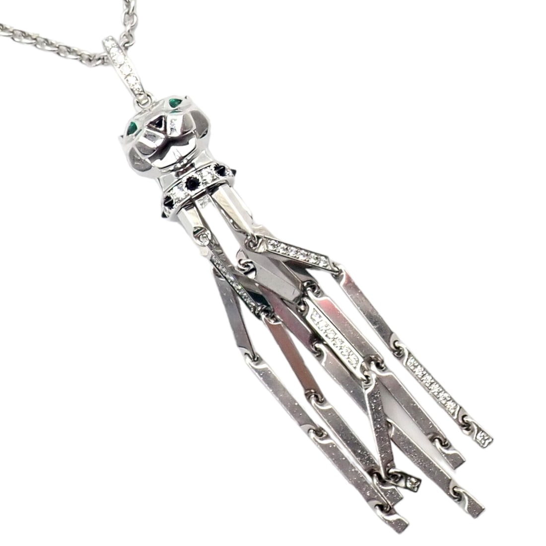 Panthere de Cartier Panther 18k White Gold Diamond Emerald Onyx Pendant Necklace: About This Piece: The Panthere de Cartier Panther pendant necklace is a masterpiece of elegance and craftsmanship