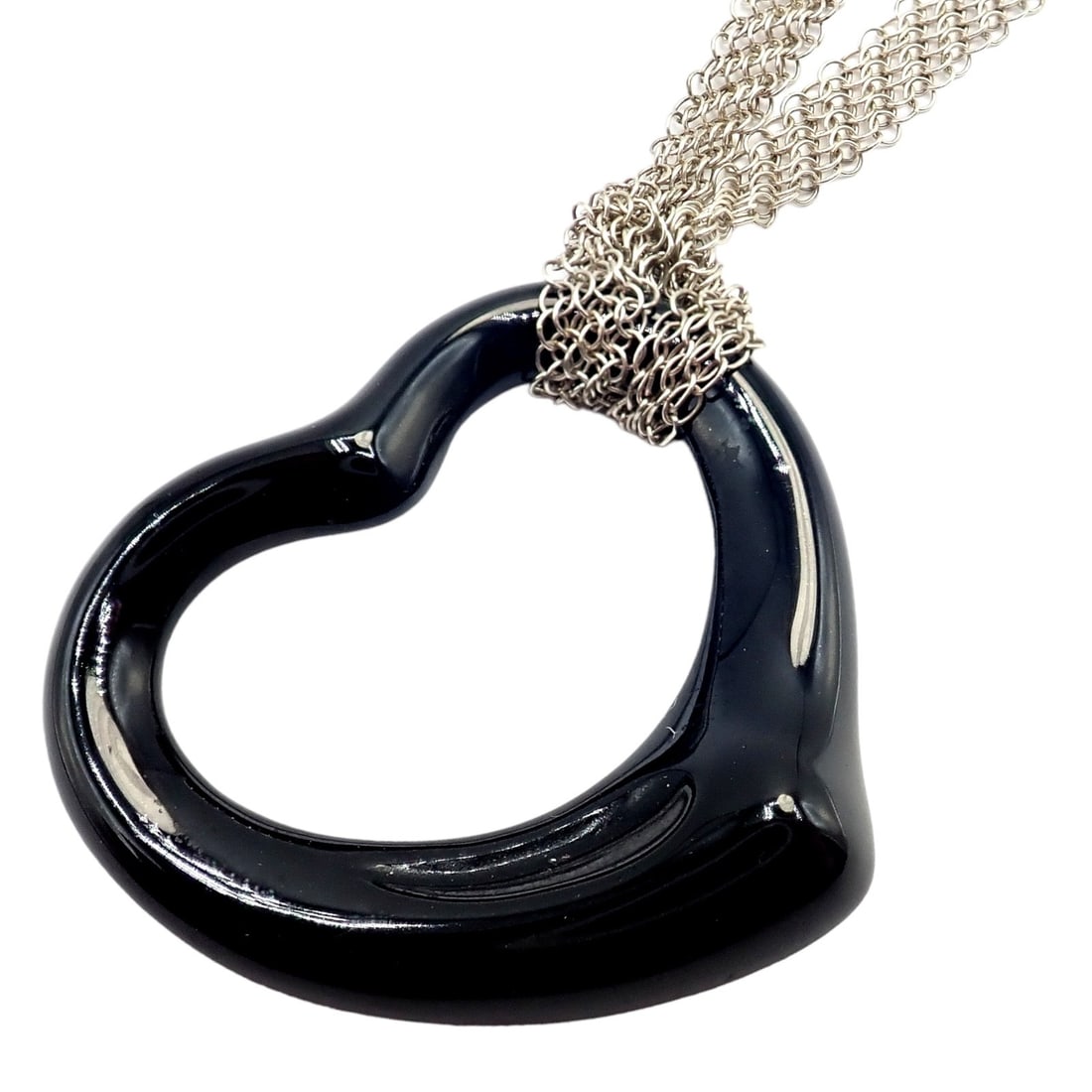 Tiffany & Co Silver Peretti 35mm Large Open Onyx Heart Pendant 28" Mesh Necklace: About This Piece: The Tiffany & Co Silver Peretti 35mm Large Open Onyx Heart Pendant on a 28" Mesh Necklace is a