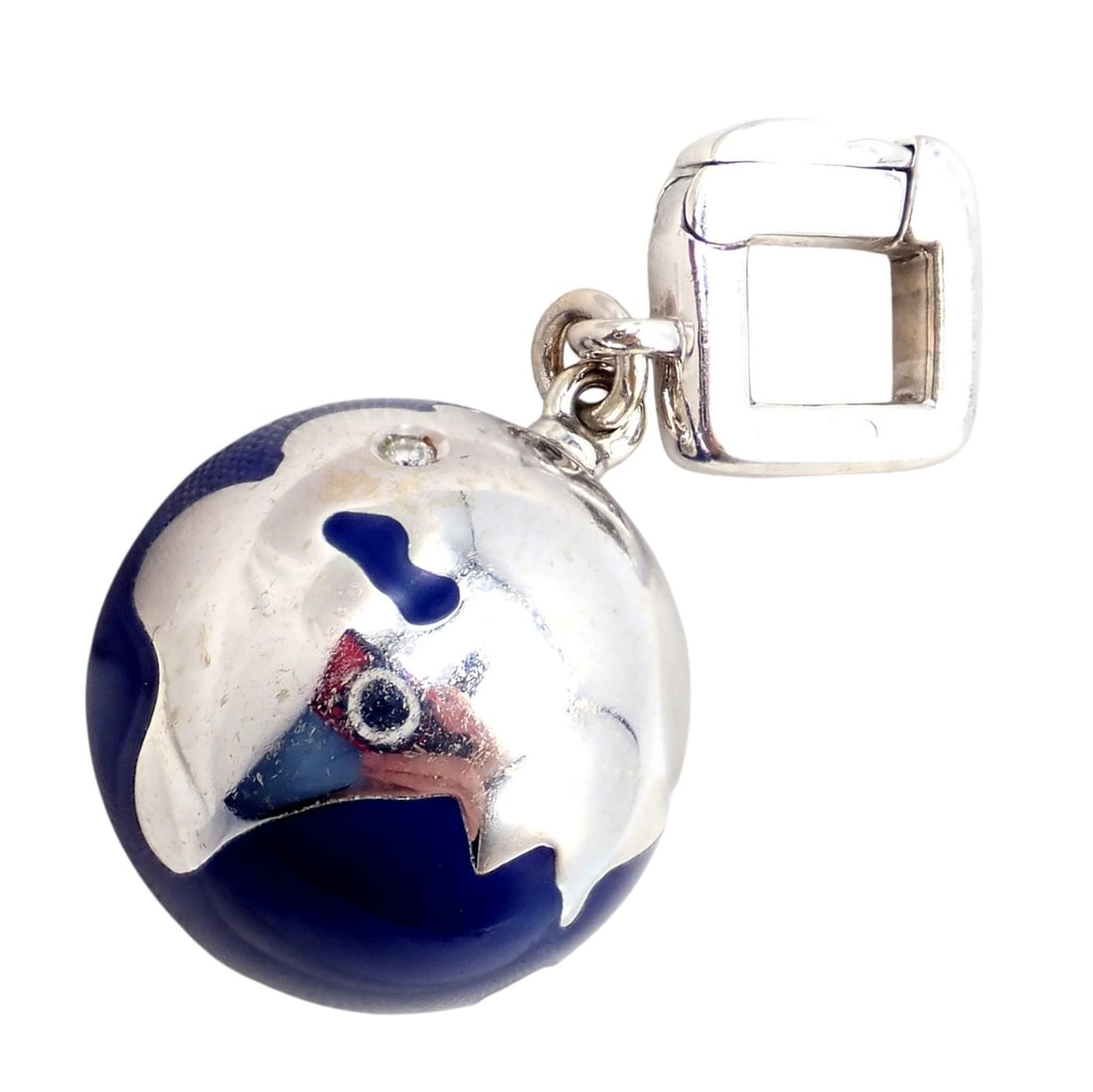 Vintage Louis Vuitton 18k White Gold Enamel Globe World Diamond Charm Pendant: About This Piece: This vintage Louis Vuitton charm features a globe design crafted in 18k white gold with rich bl