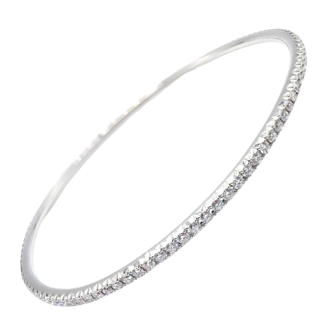 Tiffany & Co Metro 18k White Gold Full Diamond Bangle Bracelet: About This Piece: The Tiffany & Co Metro Bangle is a stunning piece crafted in 18k white gold, fully encrusted wi