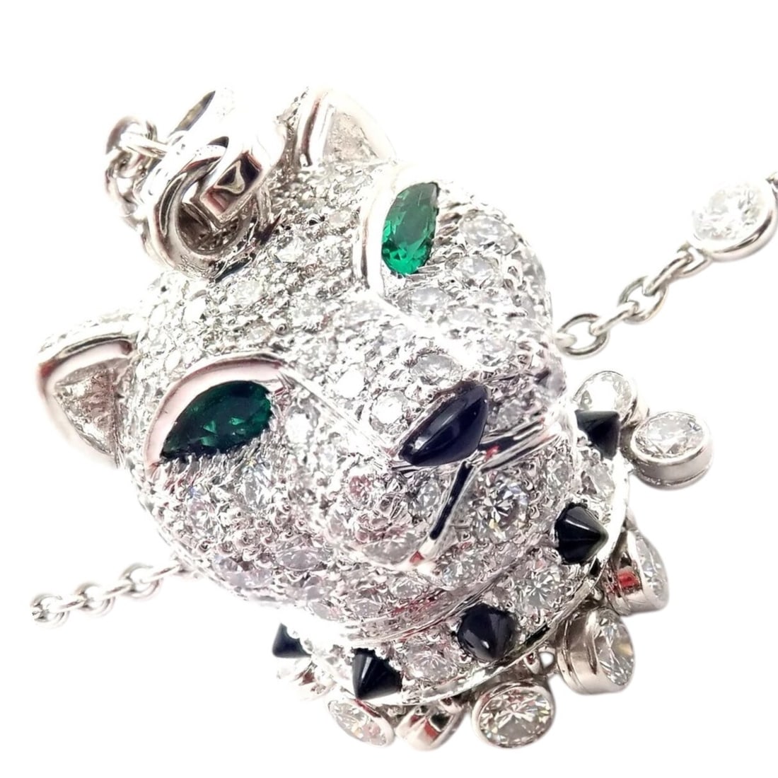 Cartier Panther 18k White Gold Diamond Emerald Onyx Pendant Necklace: About This Piece: The Authentic Cartier Panther Pendant Necklace is a luxurious masterpiece in 18k white gold, fe