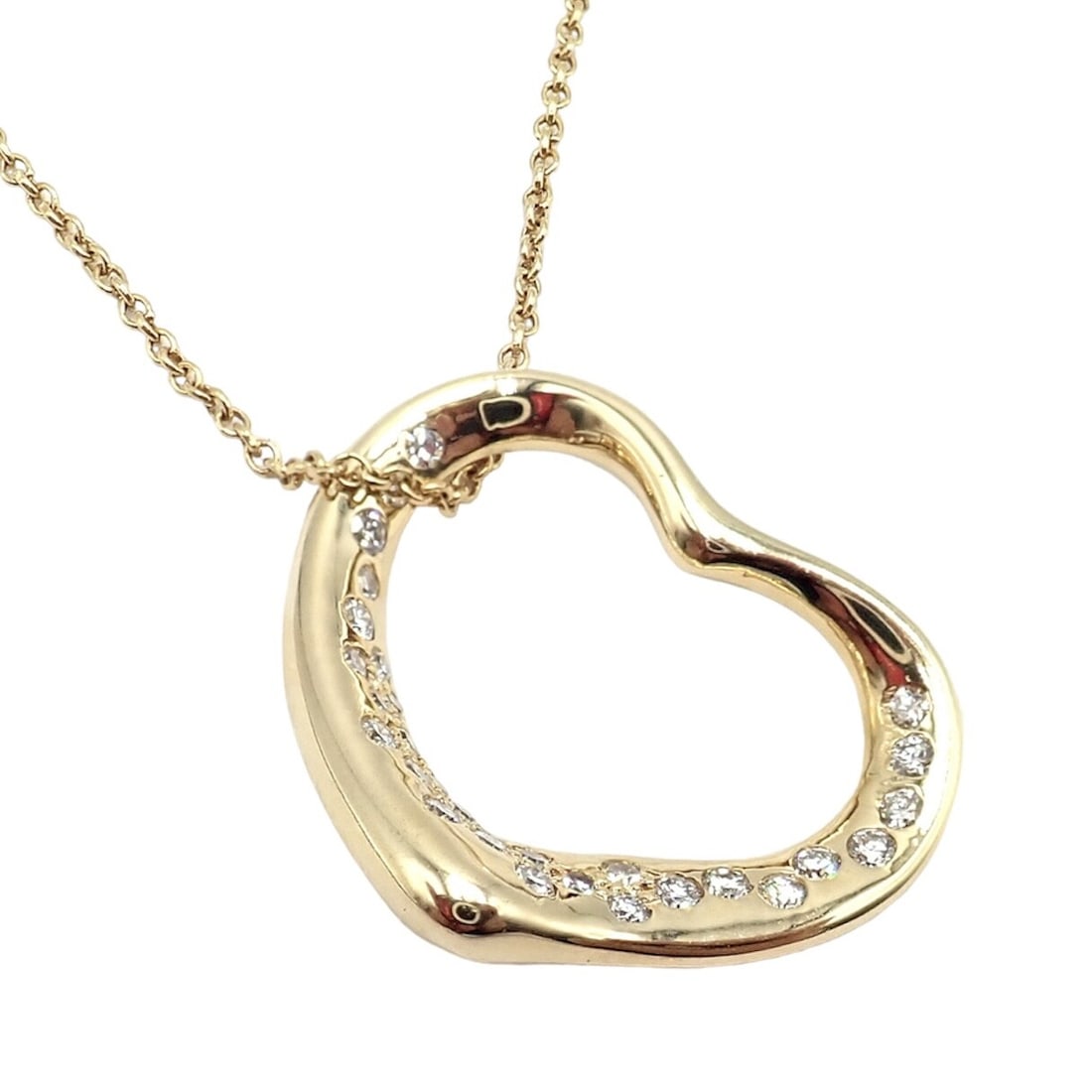 Tiffany & Co Elsa Peretti 18k Yellow Gold Diamond Open Heart Necklace: About This Piece: The Authentic Tiffany & Co Elsa Peretti necklace is crafted from 18k yellow gold and feature