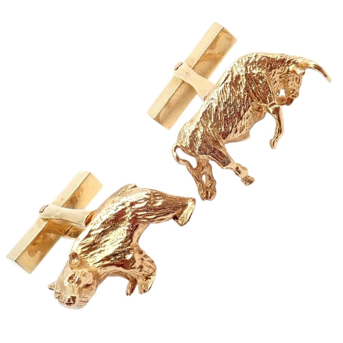 Vintage Tiffany & Co. 14k Yellow Gold Stock Market Bull Bear Cufflinks: About This Piece: Bold and symbolic, these Vintage Tiffany & Co. 14k yellow gold cufflinks feature the iconic stock market bull and bear i