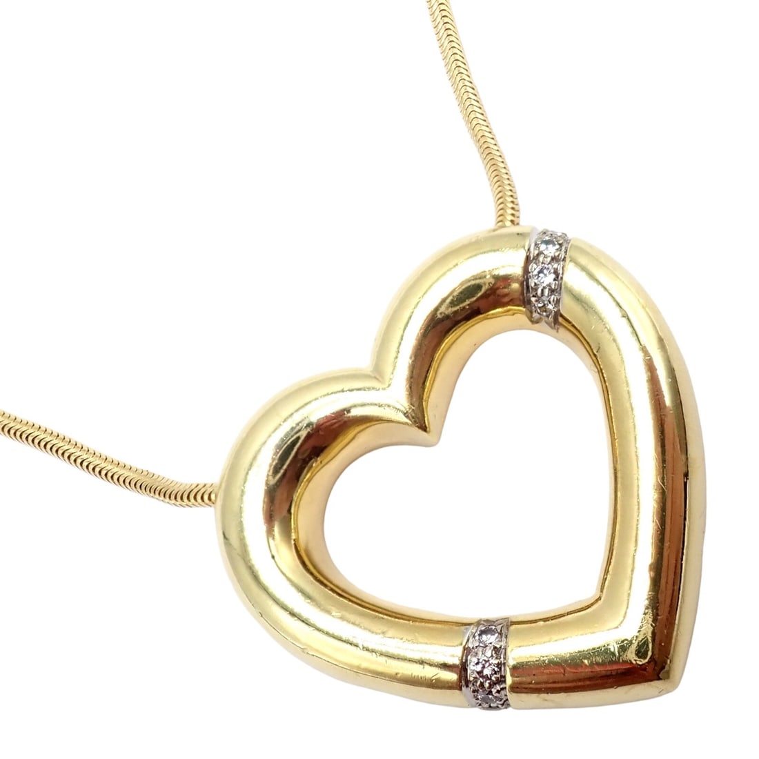 Vintage Tiffany & Co Picasso 18k Yellow Gold Diamond Large Heart Necklace: About This Piece:Tiffany & Co. Paloma Picasso large heart necklace crafted in 18k yellow gold featuring a snake chain and a large h