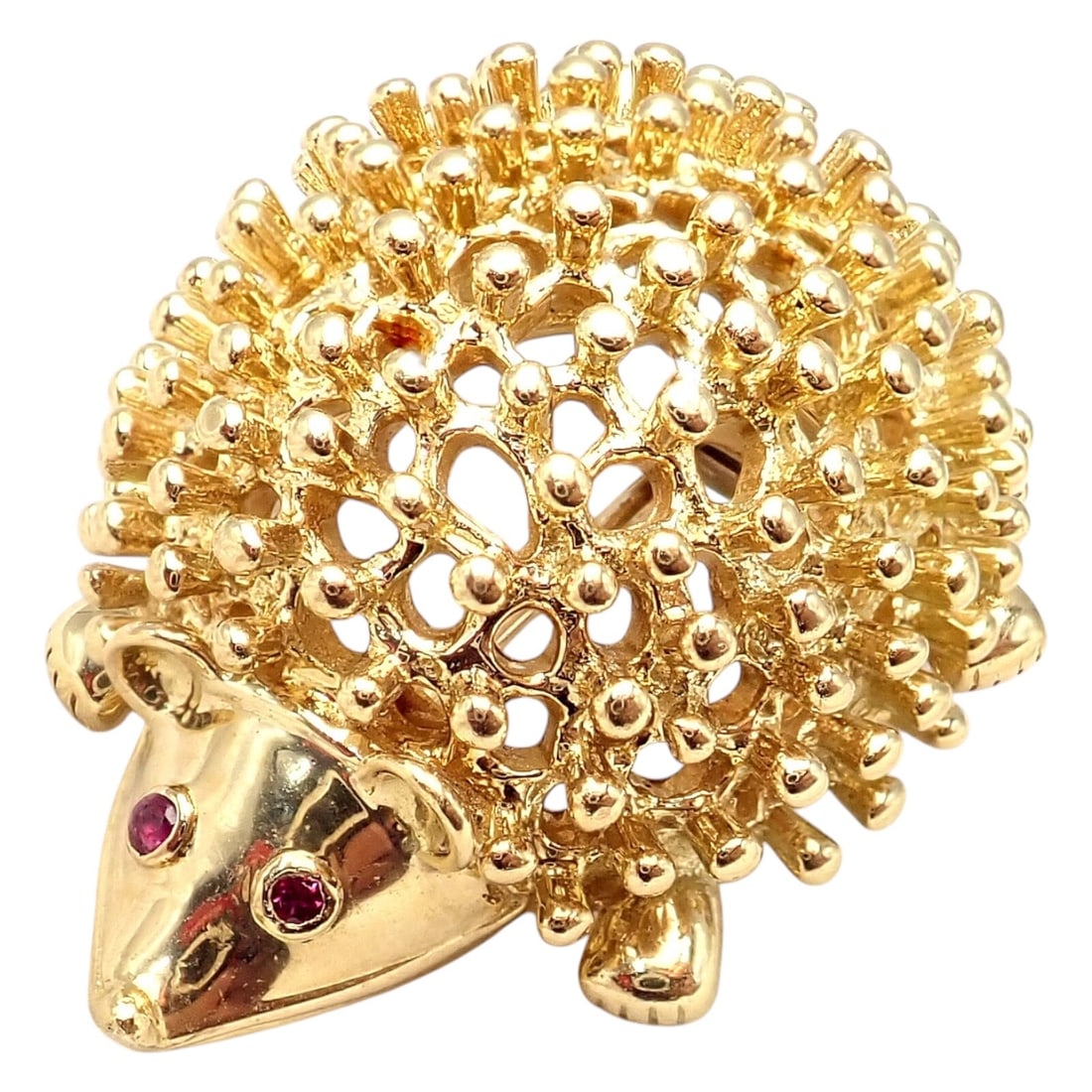 Tiffany & Co Schlumberger 18k Yellow Gold Hedgehog Ruby Brooch Pin: About This Piece:Vintage Tiffany & Co. Schlumberger hedgehog brooch crafted in 18k yellow gold featuring ruby eyes. Dimensions: 22.