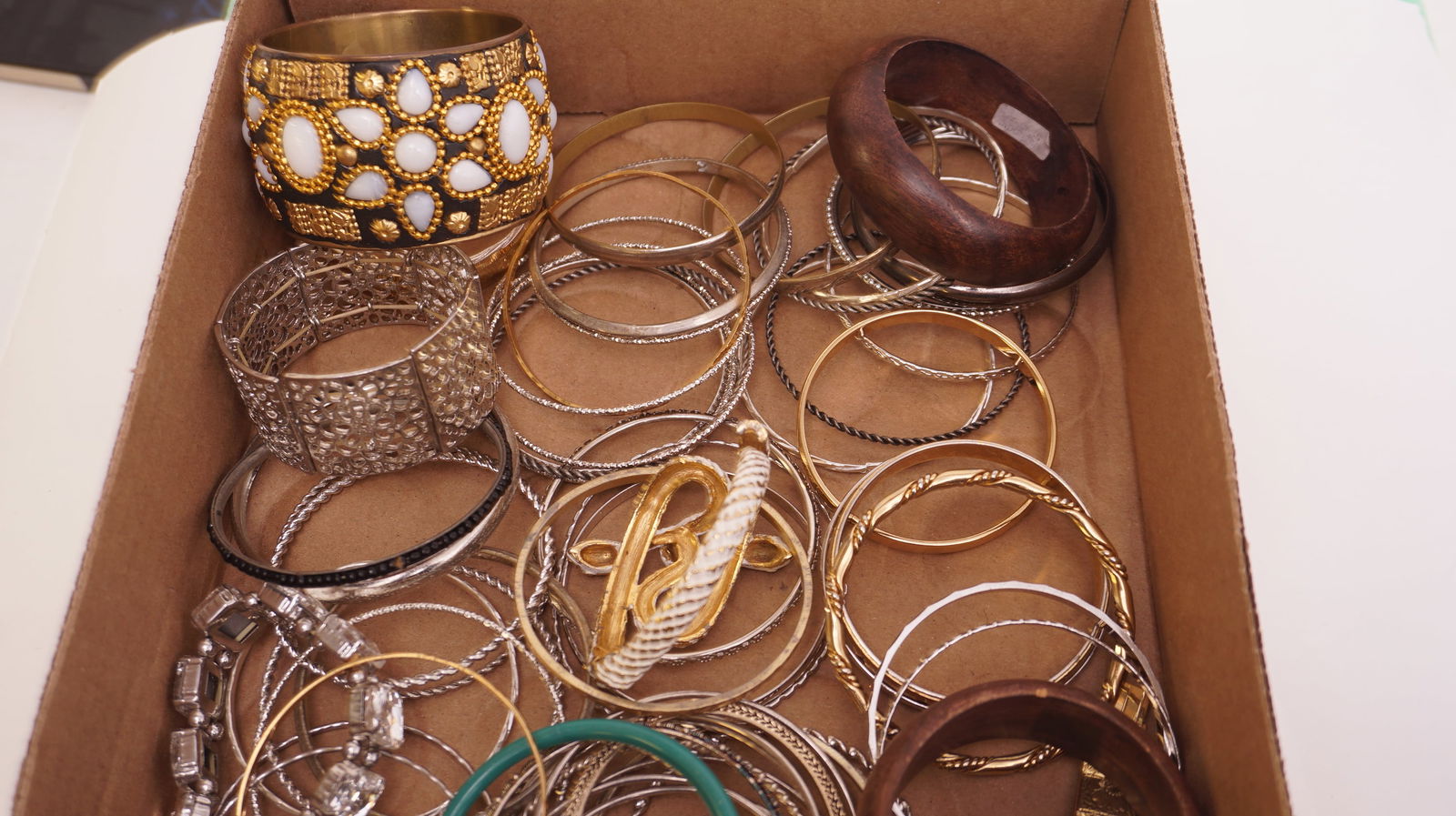 Assorted lot of Braclets Various Shapes & styles: Assorted lot of Braclets Various Shapes & styles. Includes Lots of gold and silver tone bangles