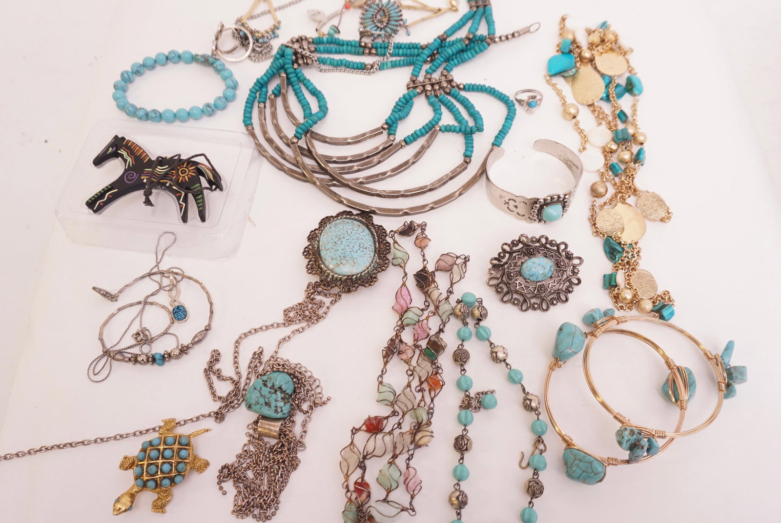Turquoise Costume Jewelry Assortment Various Styles, Shapes and Depictions: Turquoise Costume Jewelry Assortment Various Styles, Shapes and Depictions. This collection includes: Bracelets, Earrings, Necklaces, Pendants, Brooches /Pins & Rings