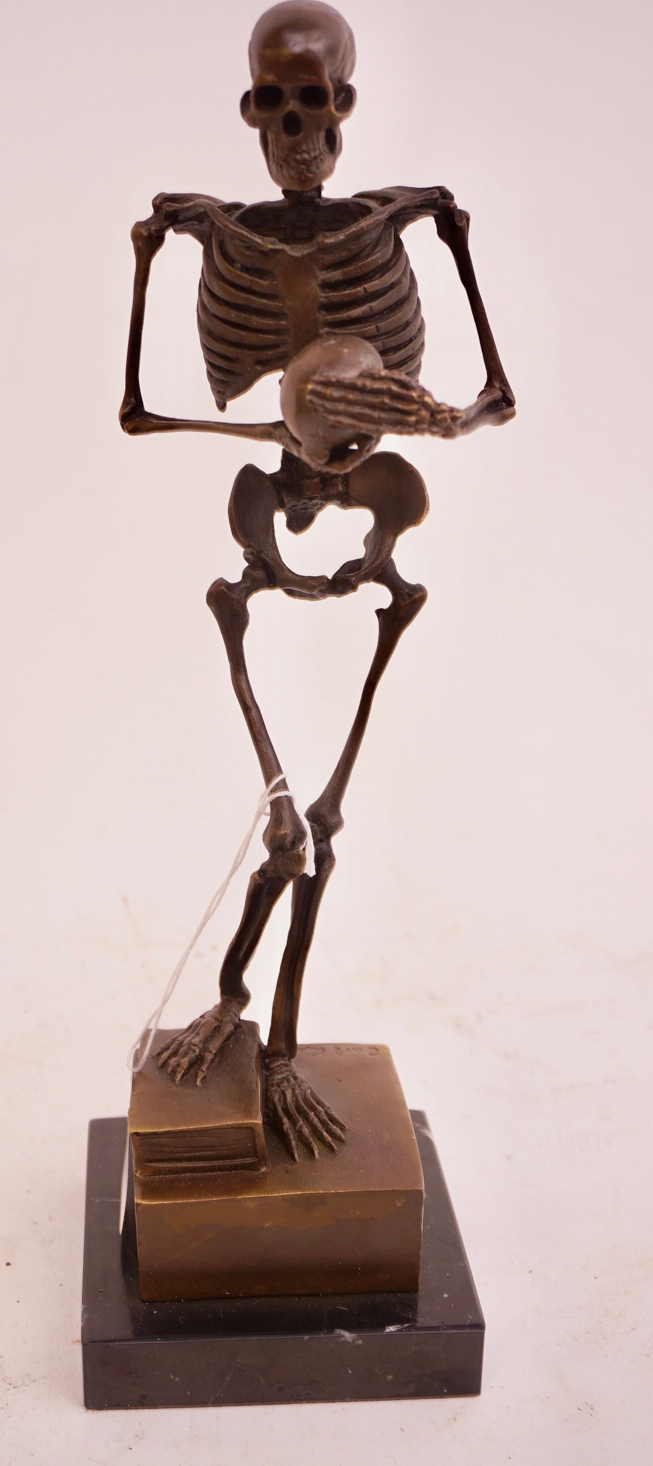 Bronze Statue Skeleton holding a Skull (1 of 3)