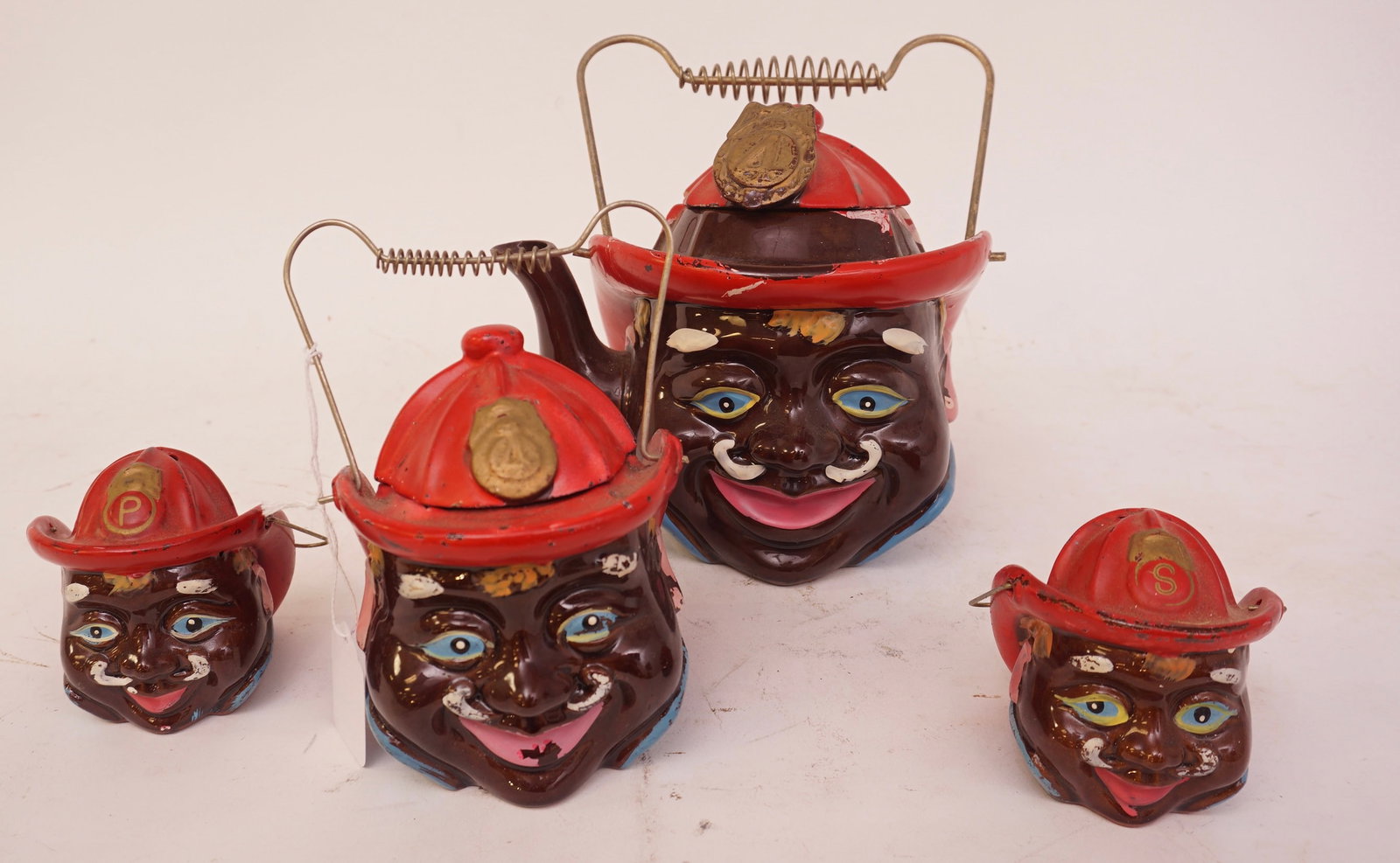 Black Americana Fireman Tea Set Tea Pot, Sugar Bowl & Salt & Pepper Shaker: Black Americana Fireman Tea Set Tea Pot, Sugar Bowl & Salt & Pepper Shaker largest pot measures 7.5" Tall