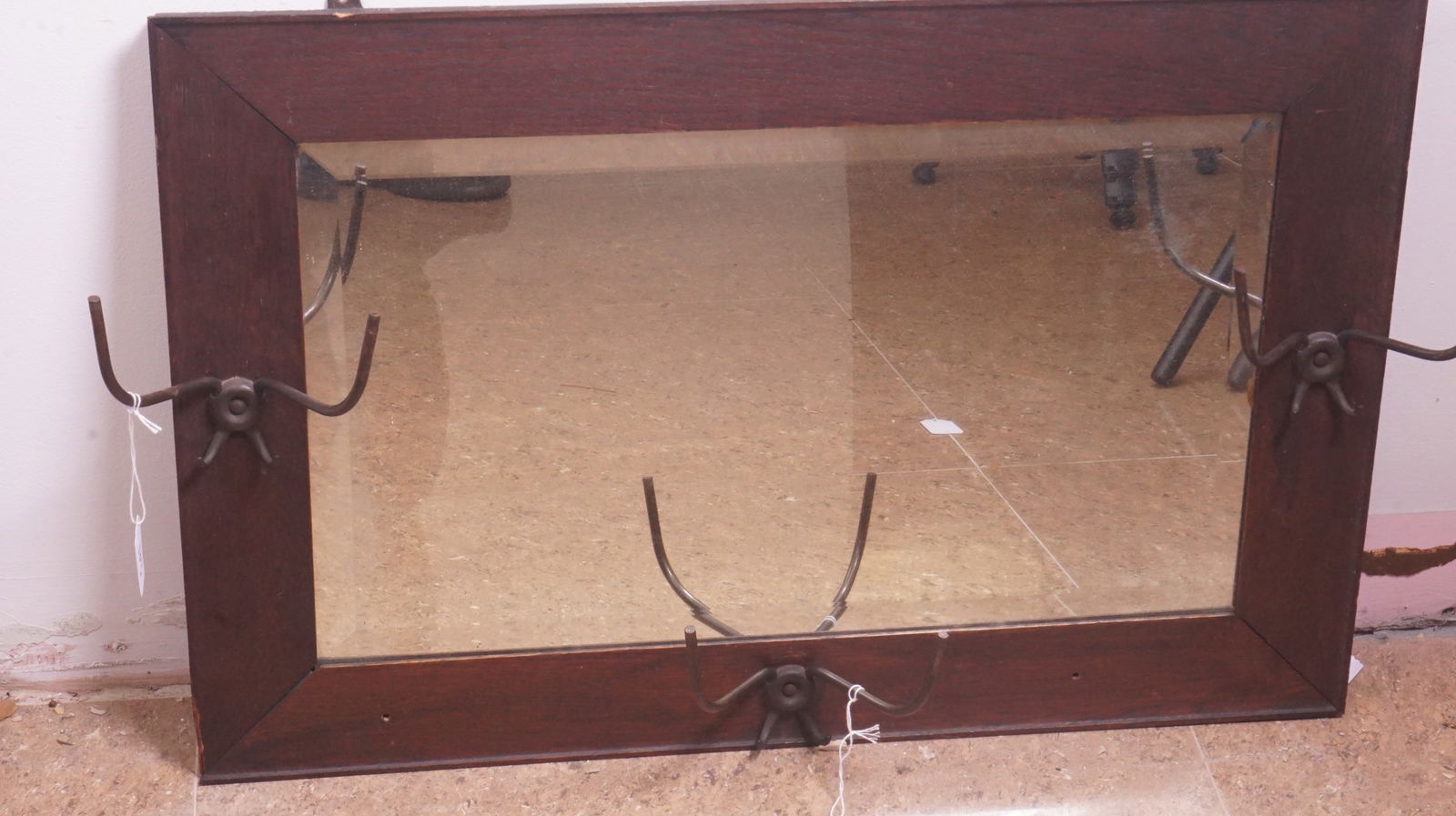 Antique Oak Hall Tree Mirror: Antique oak hanging hall tree with central mirror and possibly hooks for coats or hats.