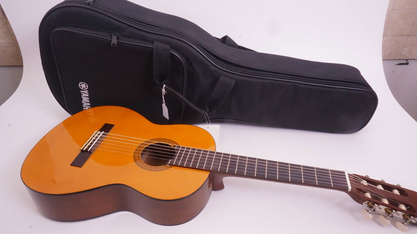Yamaha Classical Guitar: Yamaha CGS102A classical guitar in soft carrying case. Popular beginner/intermediate model.