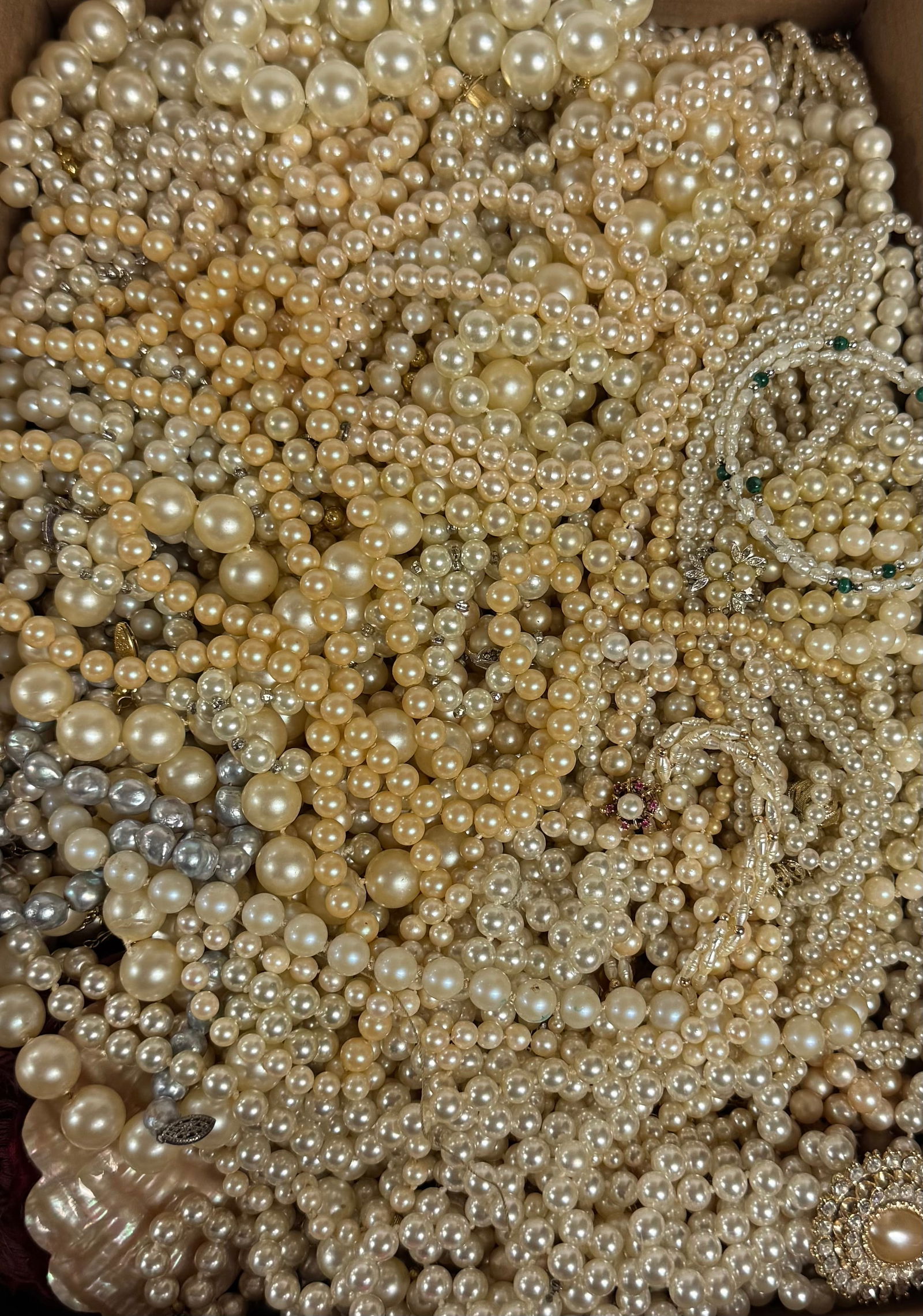 Huge Pearl Necklace Collection Mixed Lot: Large assortment of faux and real pearl necklaces with vintage clasps, multi-strand pieces, and mixed cream and ivory tones. Clean, cohesive palette ideal for resale or display. Please zoom in for qua