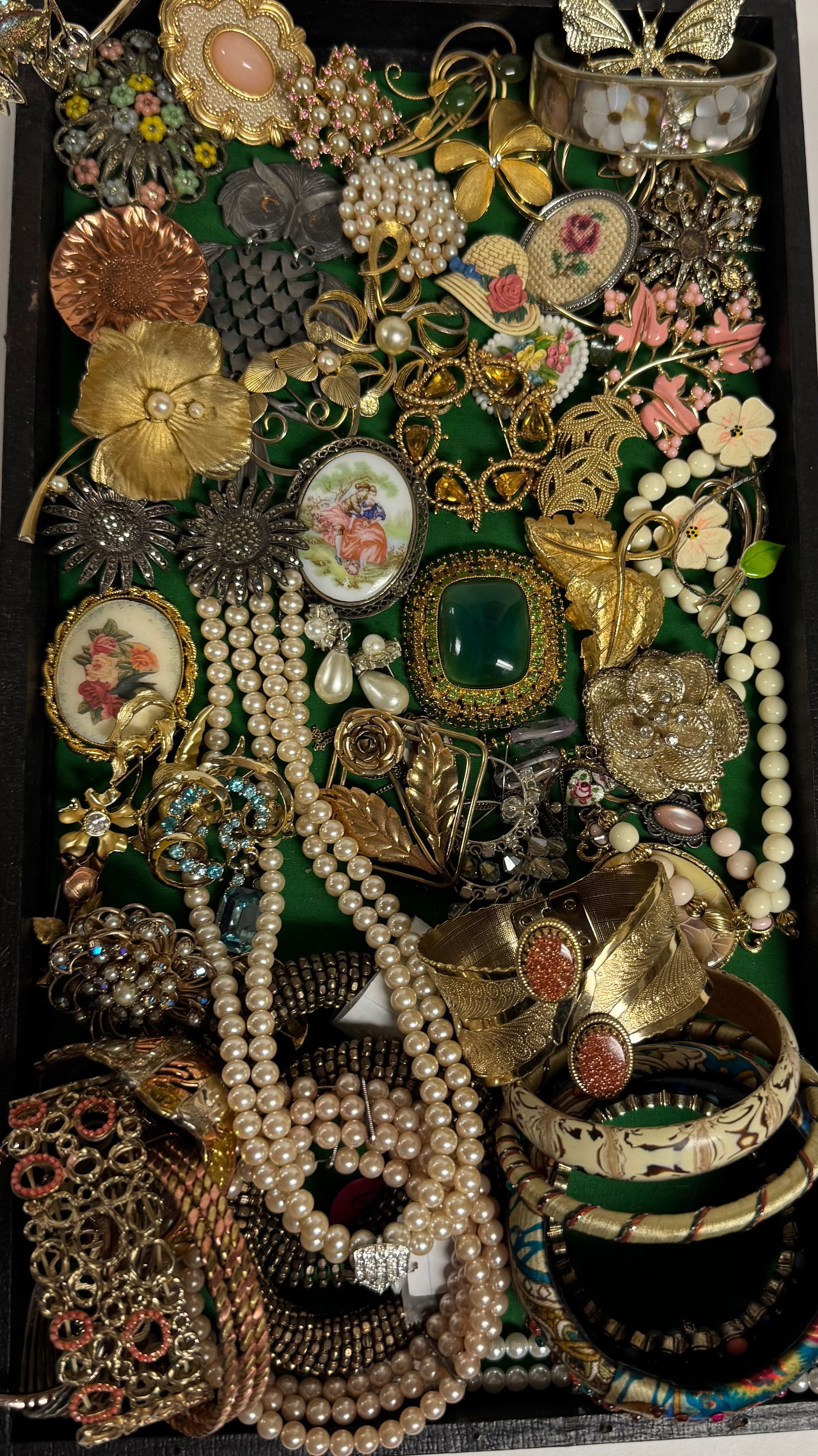 Lovely Pastel Vintage Inspired Costume Jewelry Lot: Pastel vintage-inspired collection with brooches, bracelets, bead necklaces, enamel florals, cameo-style pieces, faux pearls, and gold-tone accents. Romantic floral and soft-color designs. Please zoom