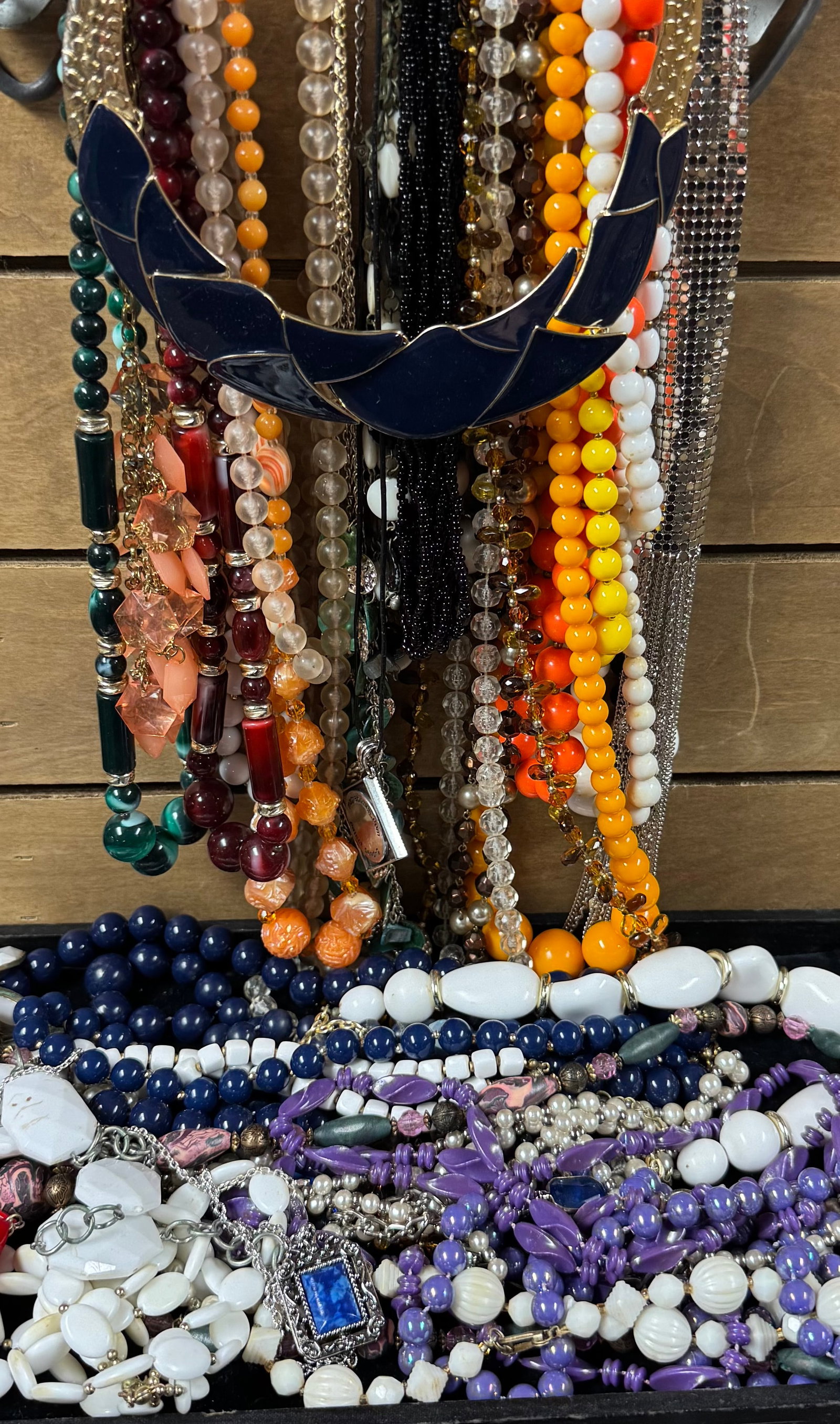 Mixed Beaded costume Jewelry assortment: Nice assortment of beaded necklaces in various materials such as glass, acrylic, wood, shell, and faux pearls, plus a large group of mixed bangles. Includes earth tones, pastels, black-white pieces, m
