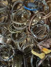Assorted lot of metal and beaded bracclets & bangles