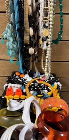 Mixed ot lof bangles and Neckalaces.in interesting materials and styles.
