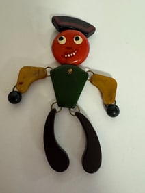 Bakalite cartoon man with moving joints Brooch