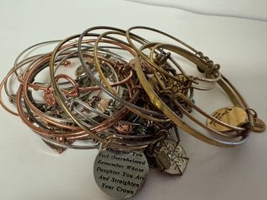 Alex & Ani collection of charmed braclettes
