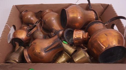 Grouping of Copper Pitchers