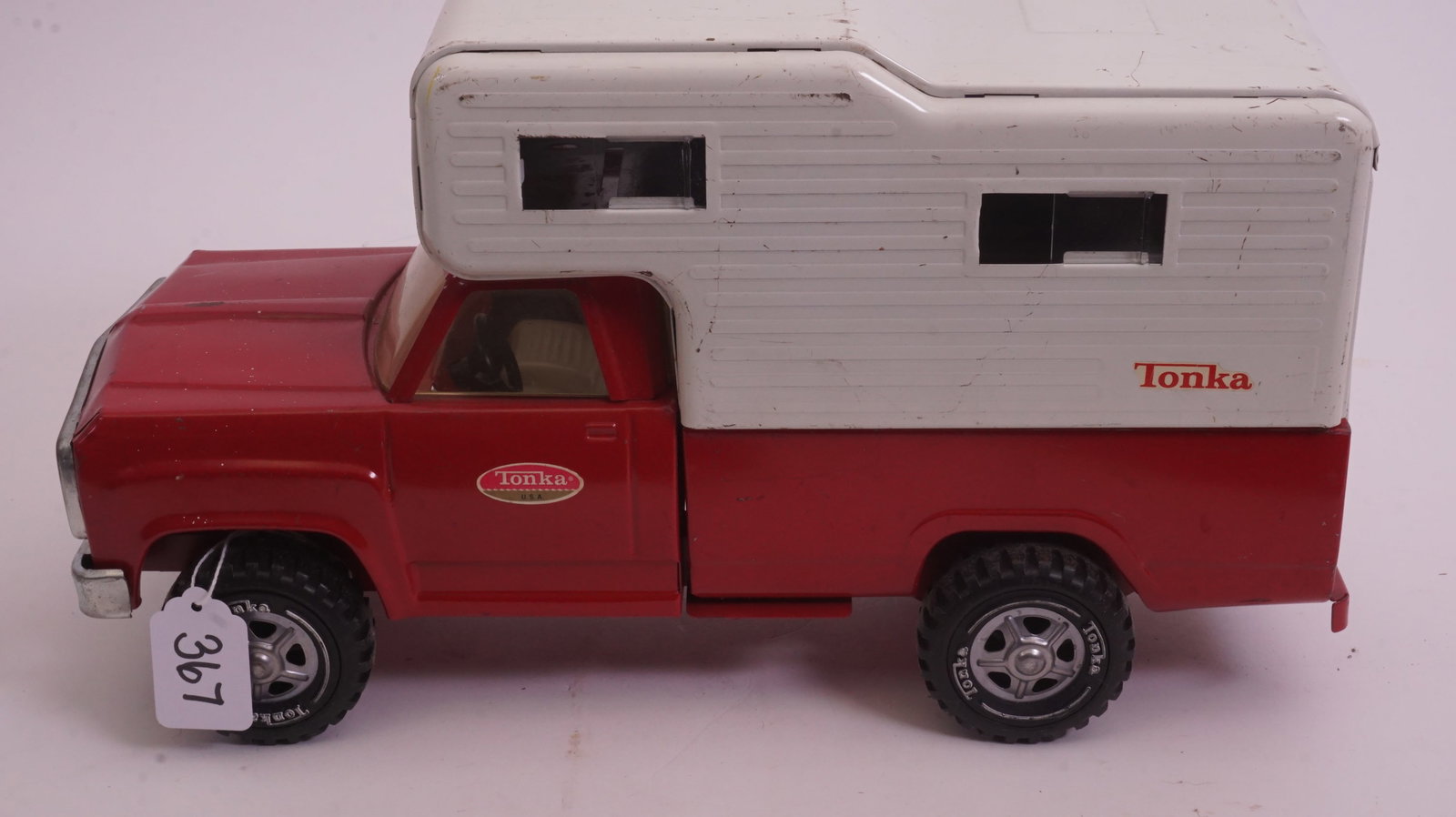 Tonka Camper Pickup Truck: Vintage Tonka camper-style pickup truck with removable camper top. Classic collectible.