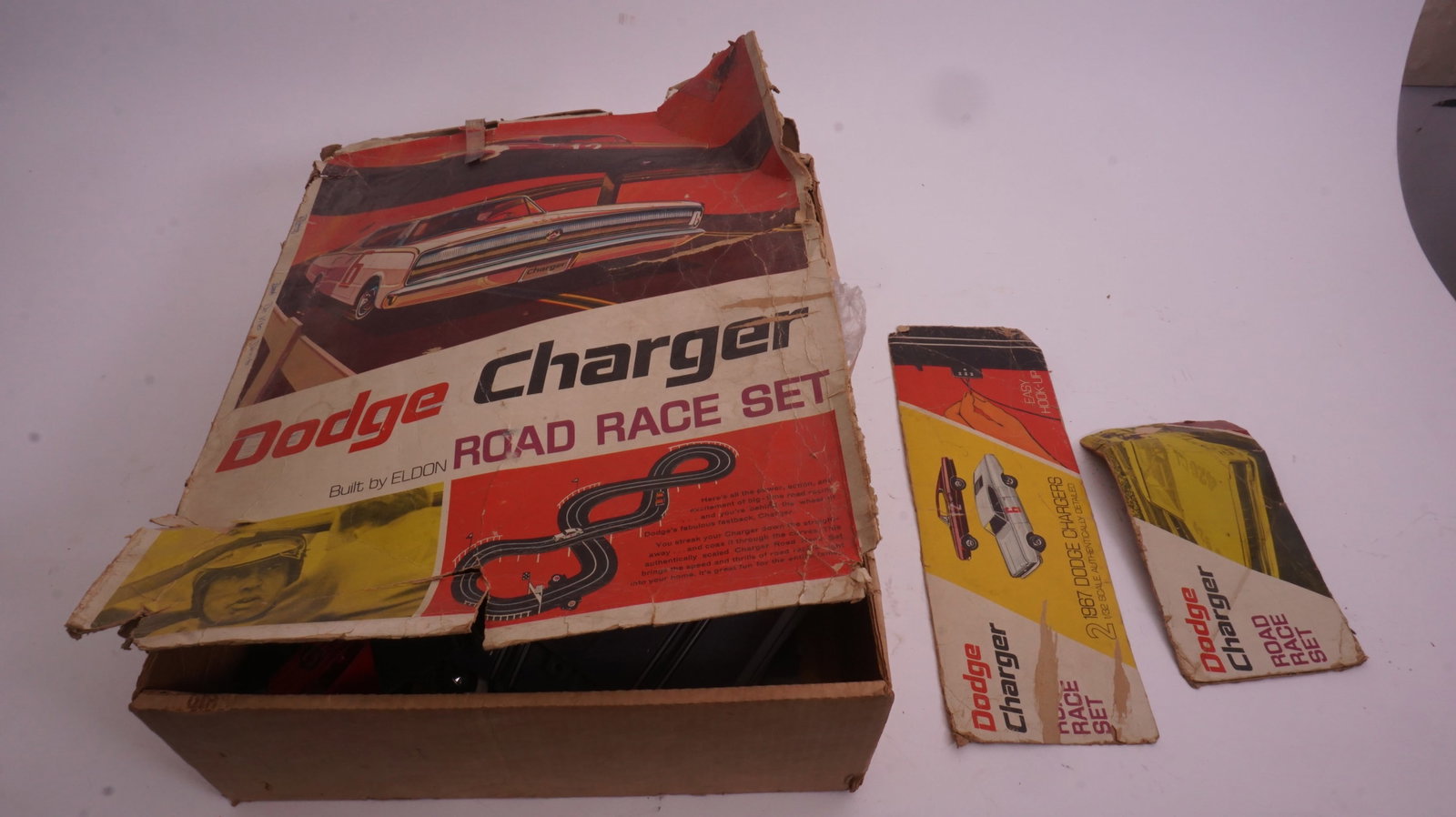 Dodge Charger Slot Car Race Set: Dodge Charger slot car race set with track and components. Classic racing collectible. Please review photos.