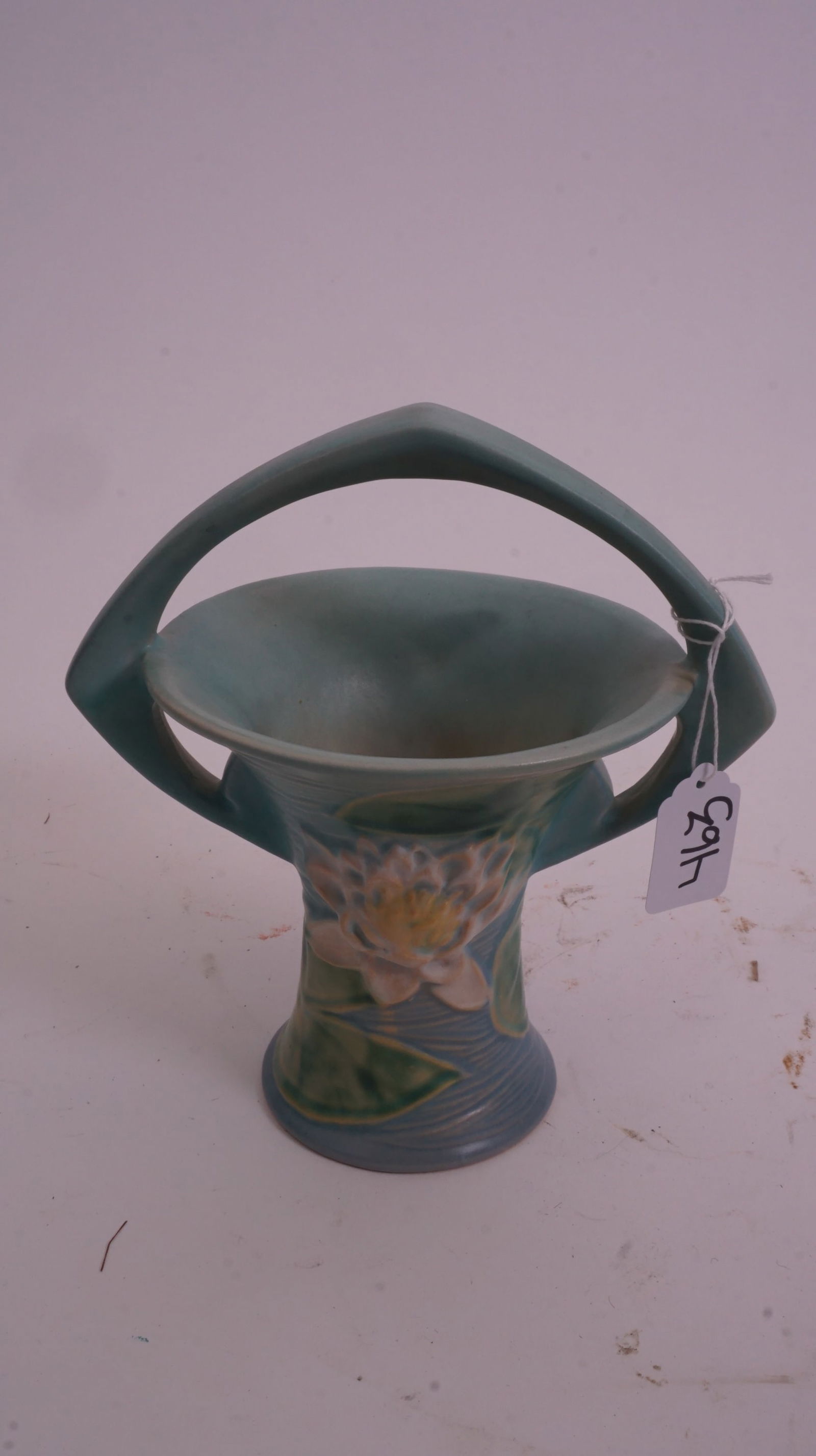 Roseville – Water Lily 380-8 Basket: Roseville Pottery Water Lily basket, form 380-8, with sculpted lily pads and blossoms around the body.