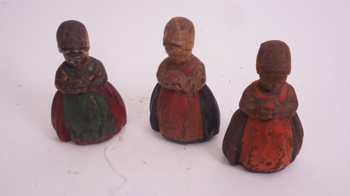 Three Cast Iron Figurines