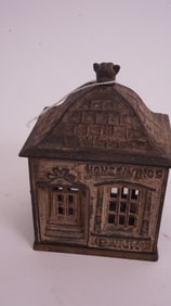 Holmes & Wings Cast Iron still Bank