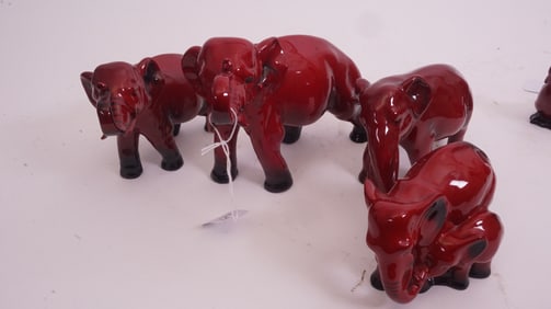 Four Royal Doulton Flambé Elephants