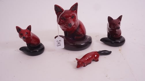 Four Royal Doulton Flambé Foxes