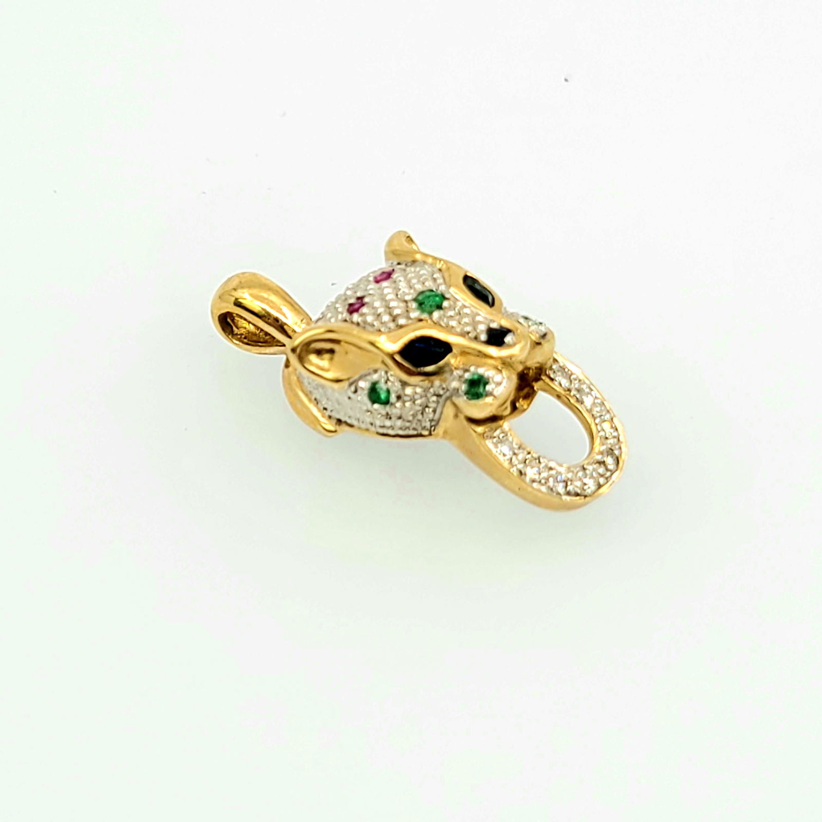Unique 10k YG Panther with Ruby, Emeralds and Sapphire: Unique 10k YG Panther with Ruby, Emeralds and Sapphire Pendant. Weighs 4.8 Grams